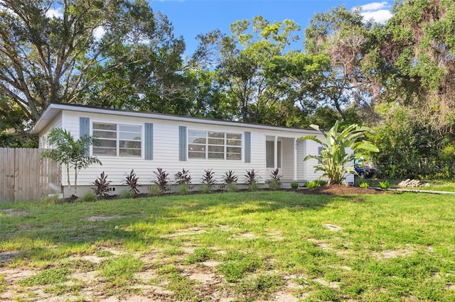 view of front of house with a front lawn