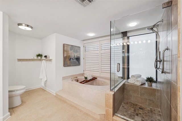 bathroom featuring separate shower and tub, tile patterned flooring, and toilet