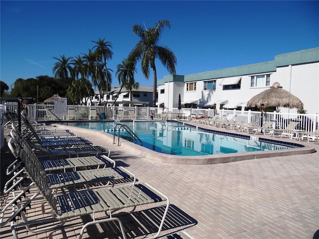 view of swimming pool with a patio area