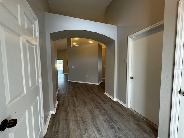 corridor featuring dark hardwood / wood-style flooring