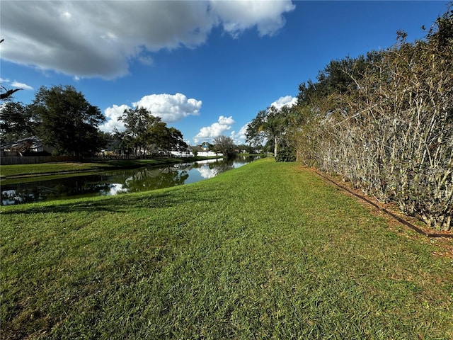 view of yard with a water view