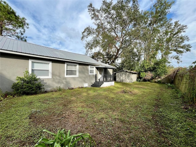 view of yard with a sunroom