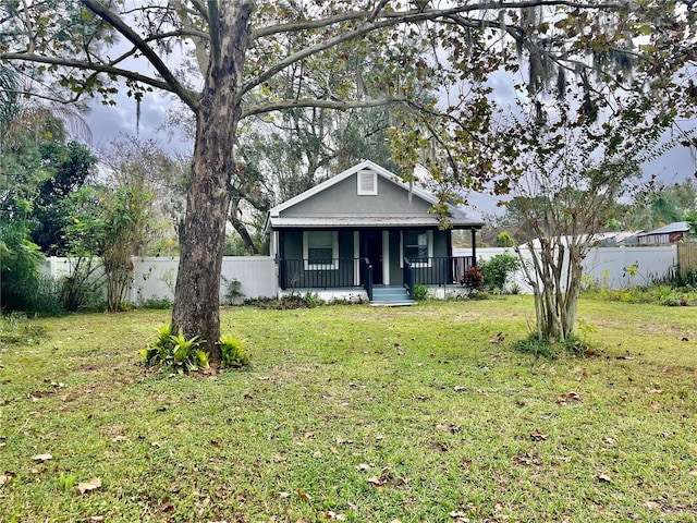 view of front of home with a front lawn