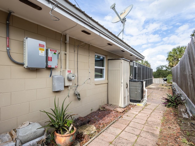 view of side of property with a sunroom