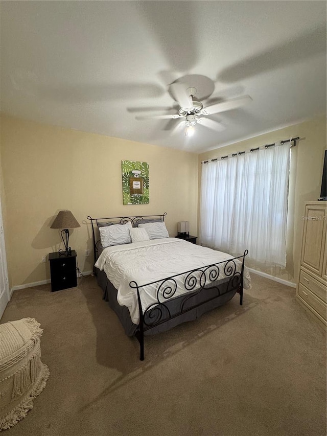 bedroom featuring carpet flooring and ceiling fan