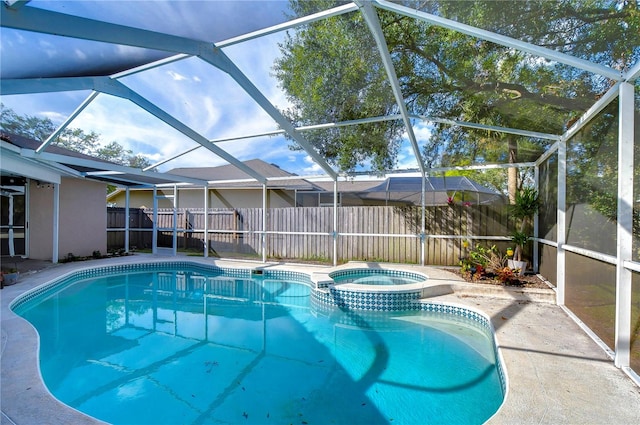 view of swimming pool with glass enclosure and an in ground hot tub