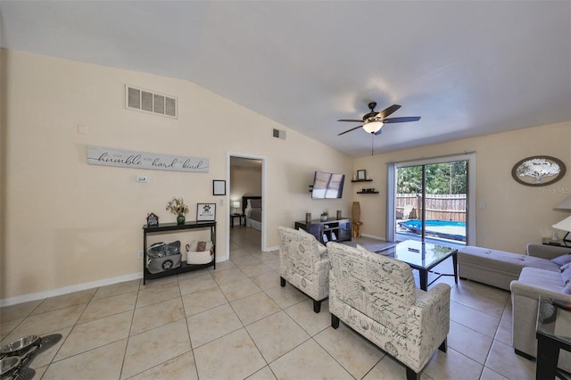 tiled living room featuring vaulted ceiling and ceiling fan