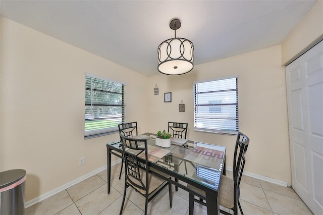 dining room featuring light tile patterned floors