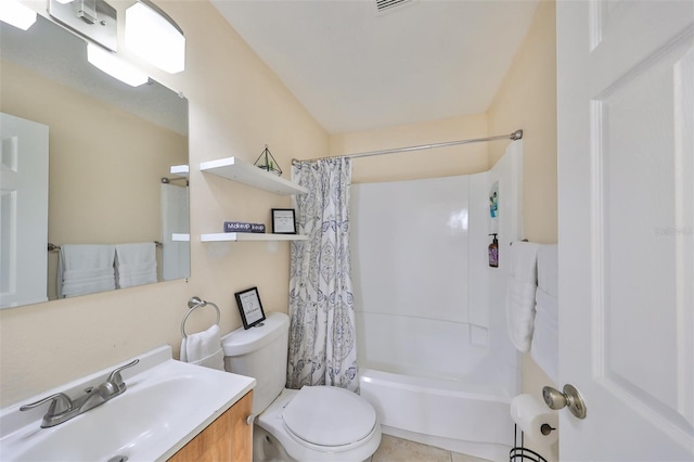 full bathroom with vanity, tile patterned floors, toilet, and shower / tub combo