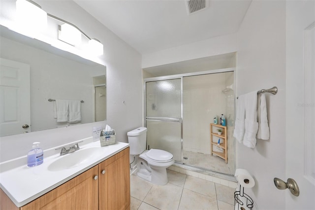 bathroom with walk in shower, tile patterned flooring, vanity, and toilet