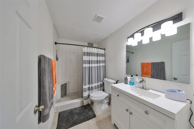 bathroom featuring vanity, tile patterned flooring, curtained shower, and toilet