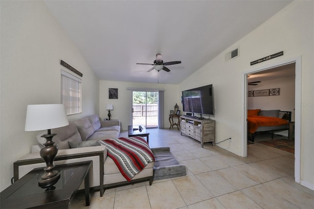 tiled living room featuring ceiling fan and lofted ceiling