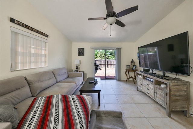 living room with light tile patterned flooring, ceiling fan, and vaulted ceiling