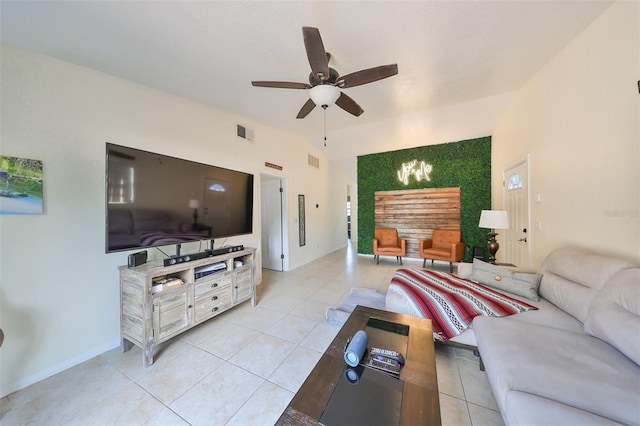 living room featuring ceiling fan and light tile patterned flooring