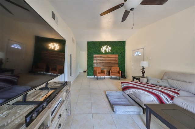 tiled living room with ceiling fan