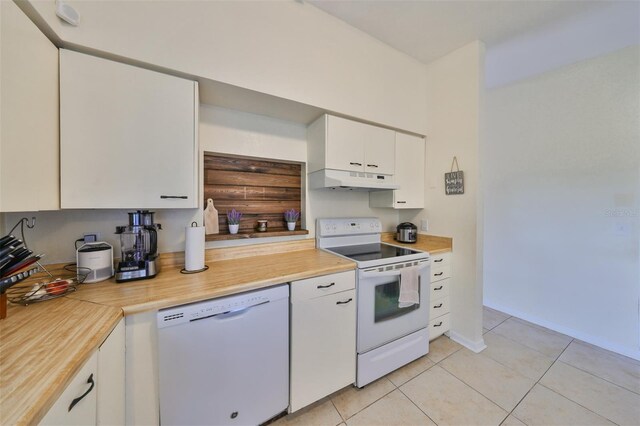 kitchen featuring white cabinetry, white appliances, and light tile patterned flooring