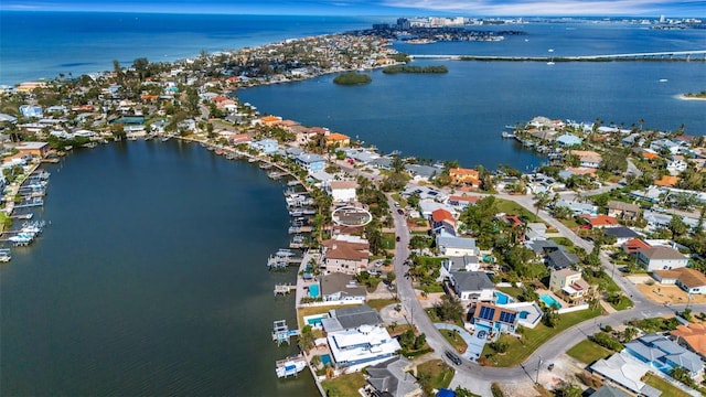 bird's eye view featuring a water view and a residential view