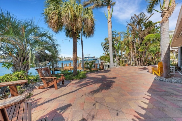 view of patio featuring a water view