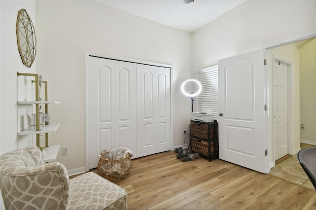 sitting room with light hardwood / wood-style flooring