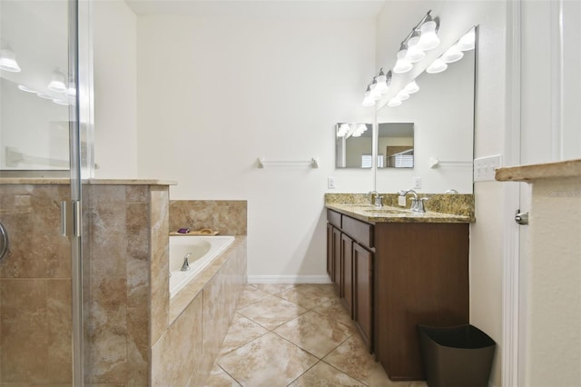 bathroom featuring tile patterned flooring, vanity, and independent shower and bath