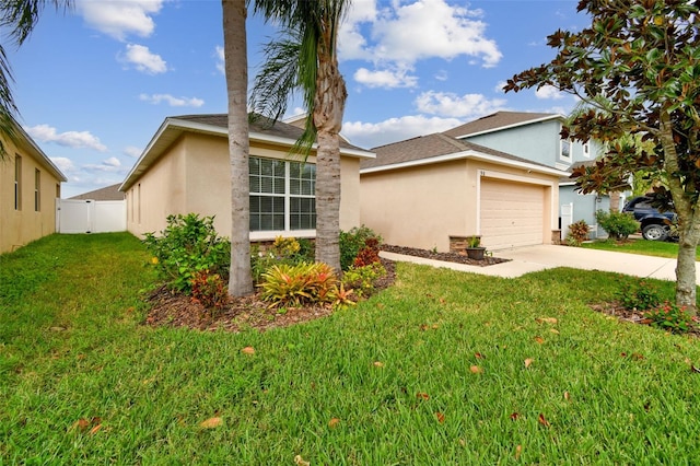 view of front of house with a garage and a front yard