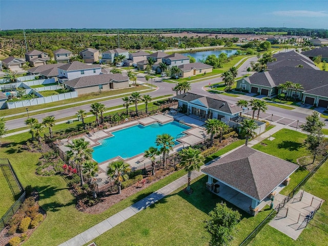 birds eye view of property featuring a water view