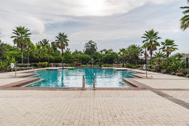 view of pool featuring a patio