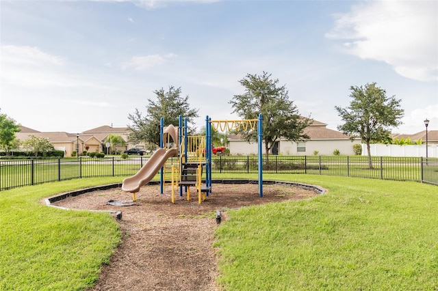 view of play area with a yard