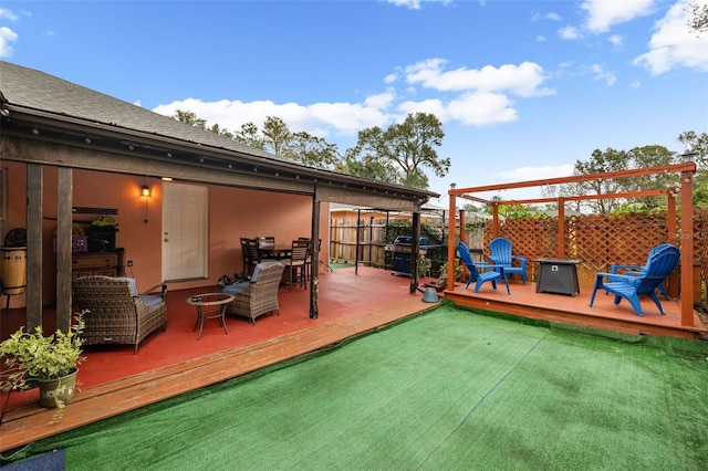 3334 W Heiter St, Tampa, FL 33607 - view of patio / terrace with an outdoor fire pit, a deck, fence, and outdoor dining area