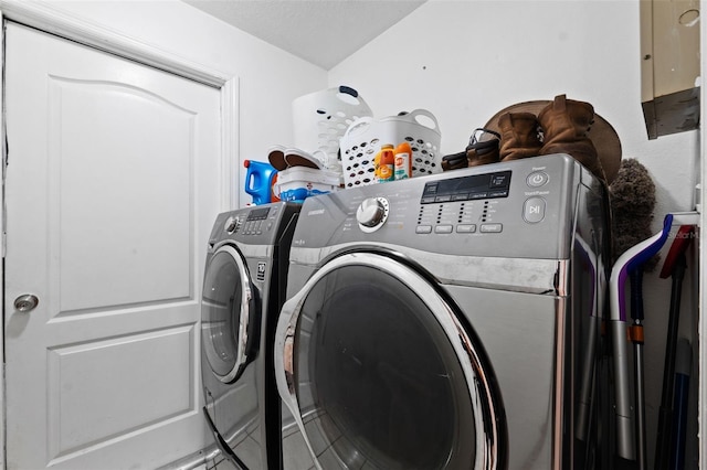 washroom featuring washer and dryer