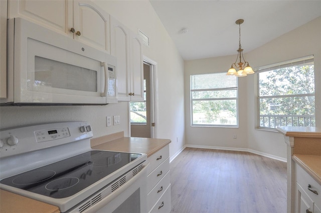 kitchen featuring white cabinets, white appliances, vaulted ceiling, and light hardwood / wood-style flooring