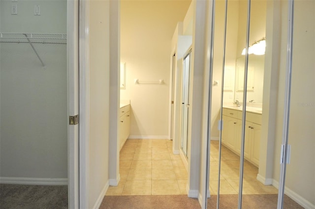 bathroom featuring tile patterned floors and vanity