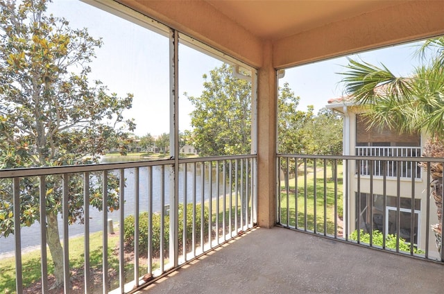 balcony featuring a water view