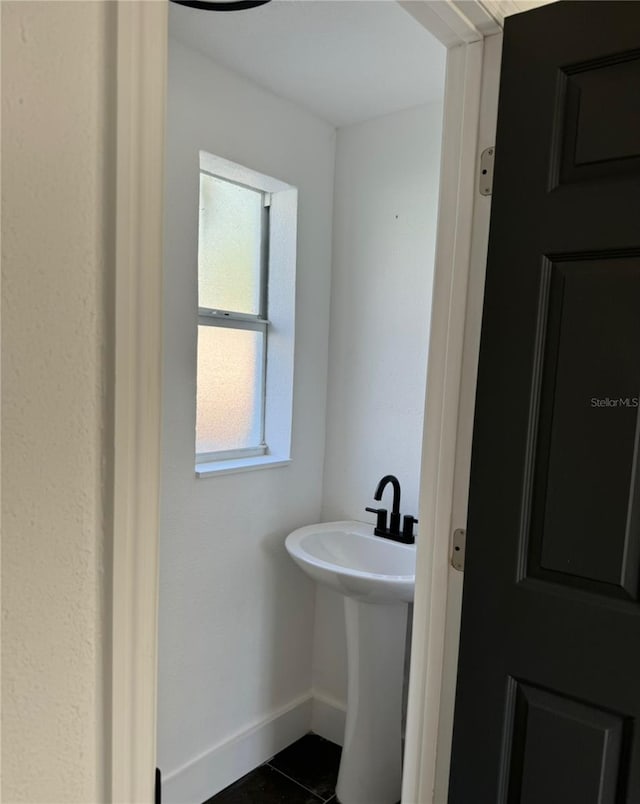 bathroom featuring tile patterned flooring