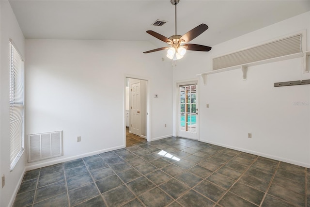 unfurnished room with ceiling fan and lofted ceiling