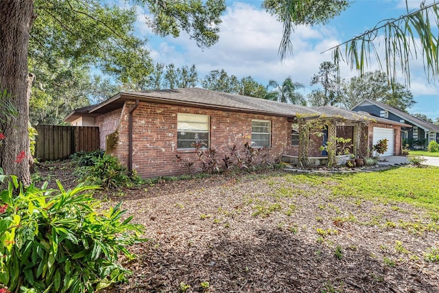 ranch-style home with a garage