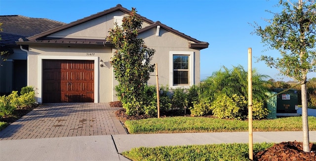 view of front of house with a garage