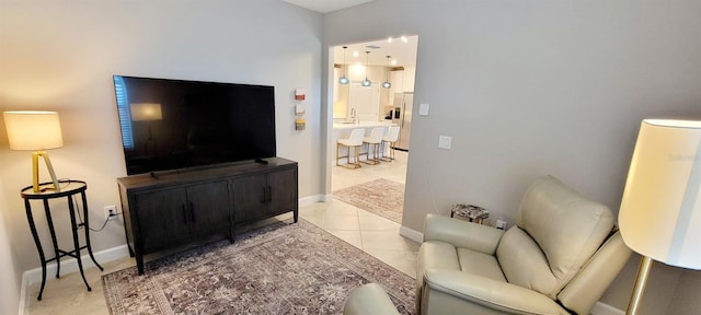 living room featuring light tile patterned flooring