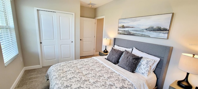 carpeted bedroom with a closet