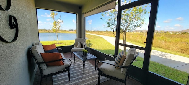 sunroom with a water view