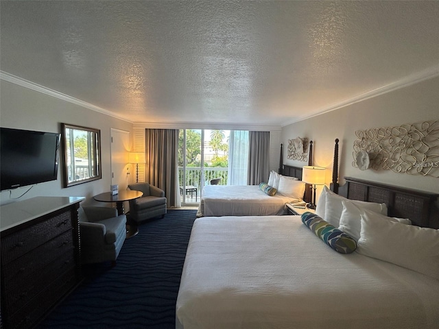 bedroom featuring access to exterior, crown molding, and a textured ceiling