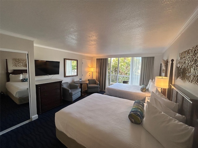 bedroom featuring dark colored carpet, a textured ceiling, multiple windows, and crown molding