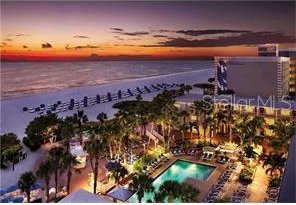 5500 Gulf Blvd Unit 2237, St Pete Beach, FL 33706 - bird's eye view of a pool area and a nearby body of water