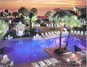 5500 Gulf Blvd Unit 2237, St Pete Beach, FL 33706 - pool at dusk with a community pool
