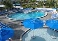 5500 Gulf Blvd Unit 2237, St Pete Beach, FL 33706 - community pool with a patio