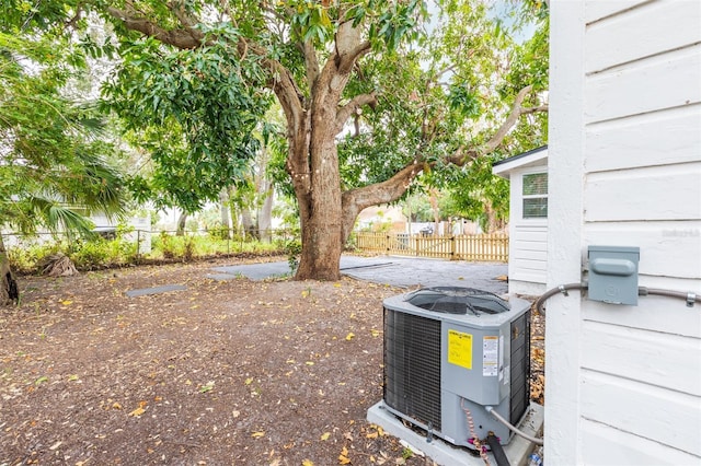 view of yard with central air condition unit