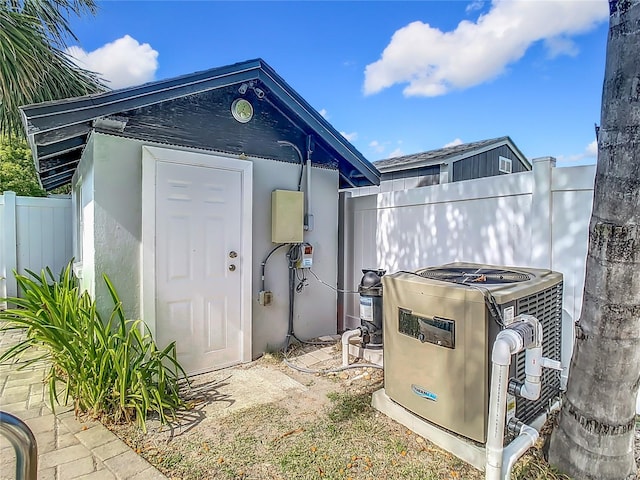 view of outbuilding with central air condition unit