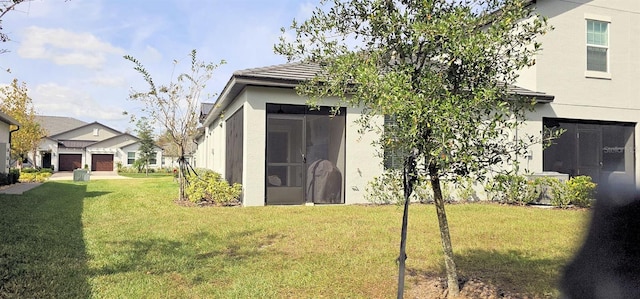 view of outbuilding with a lawn