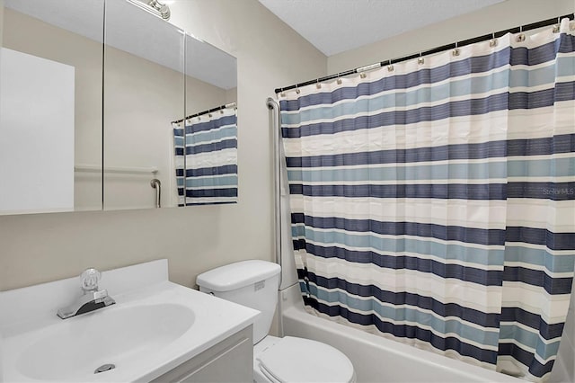 full bathroom with toilet, vanity, a textured ceiling, and shower / bathtub combination with curtain