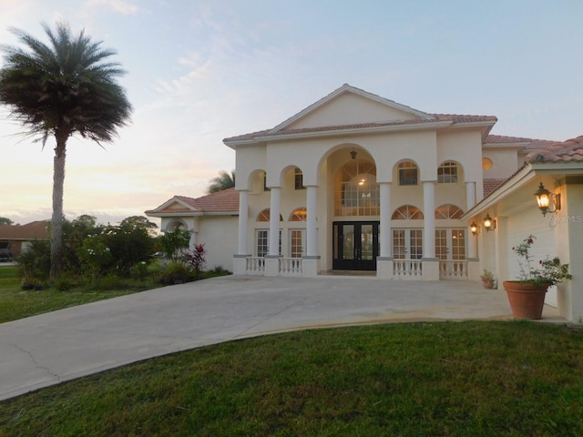 view of front of house featuring french doors and a garage